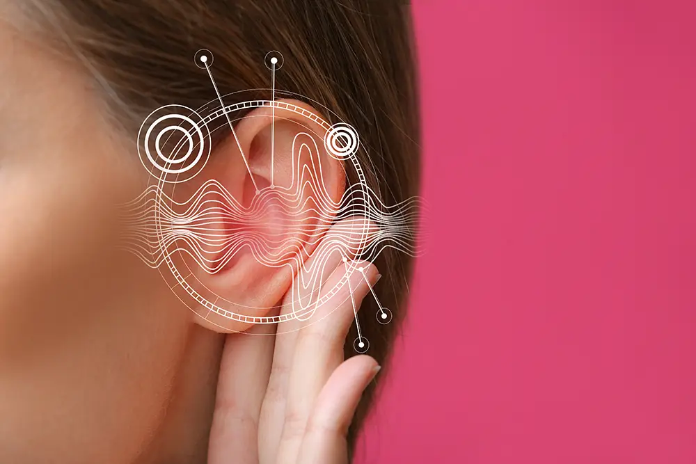 Picture of an ear with a sound waves illustration overlaid