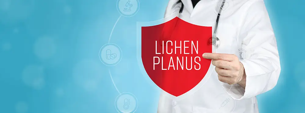 A doctor holding a read shield that reads "Lichen Planus"